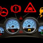 Warning lights on a car dashboard in Darwin