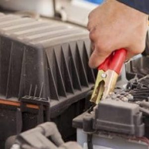 An auto electrician testing a vehicle in Darwin