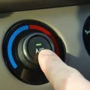 An AC button in a vehicle in the Darwin workshop